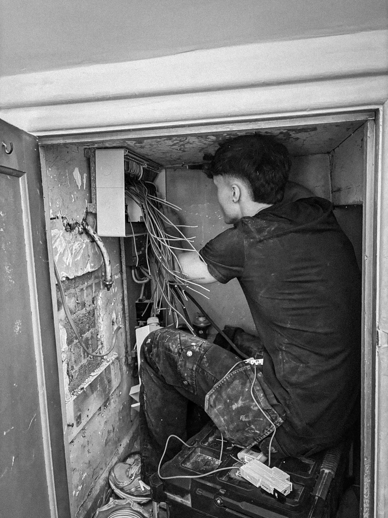 Oliver from OM Electrical Solutions working on a job in Norfolk